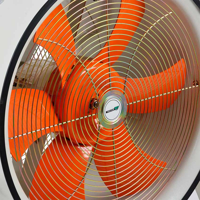 Close-up of an orange industrial fan with a visible brand logo.