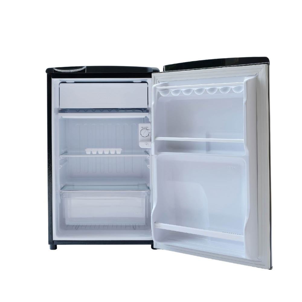 Small refrigerator with open door on a white background